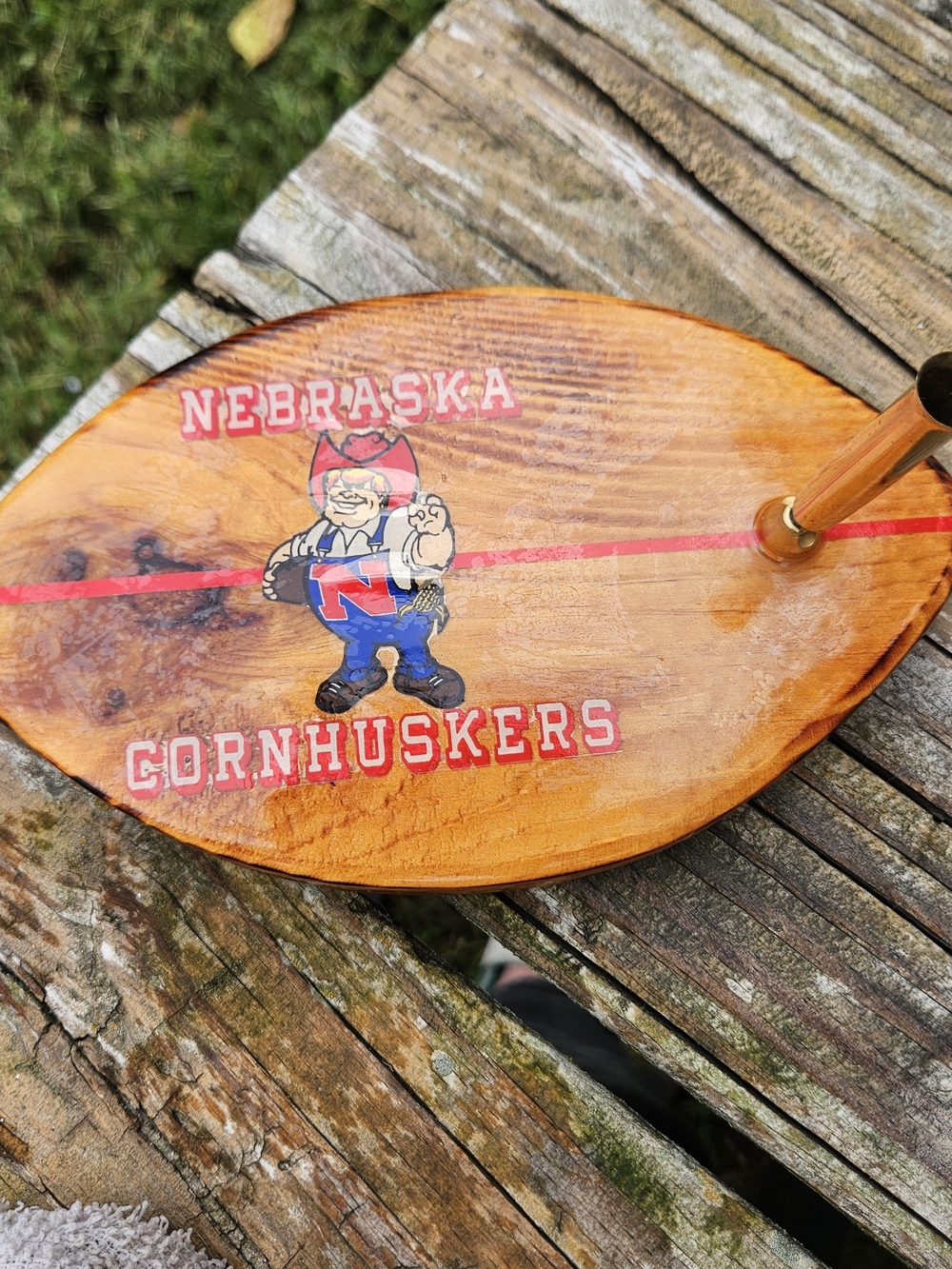 Wooden Football Herbie Husker red "NEBRASKA" and "CORNHUSKERS" Pen Holder